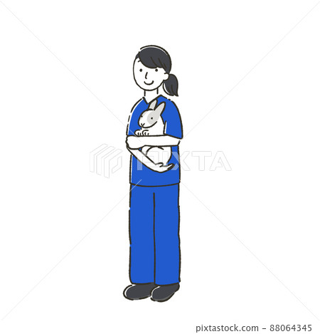 Female veterinarian holding a rabbit Female veterinarian holding a rabbit 88064345