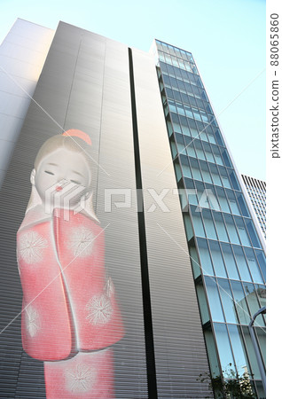 White building and Japanese doll White building and Japanese doll 88065860
