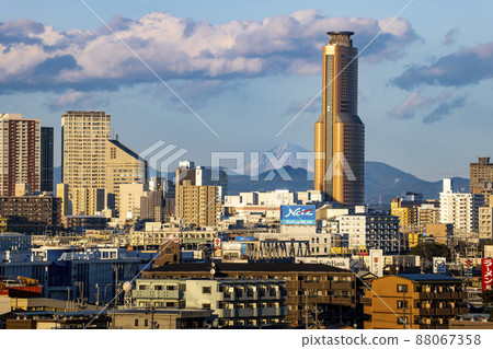 Mt. Fuji at dusk over the city center as seen from Hamamatsu City, Shizuoka Prefecture 88067358