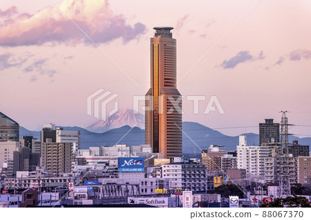 Mt. Fuji at dusk over the city center as seen from Hamamatsu City, Shizuoka Prefecture Mt. Fuji at dusk over the city center as seen from Hamamatsu City, Shizuoka Prefecture 88067370