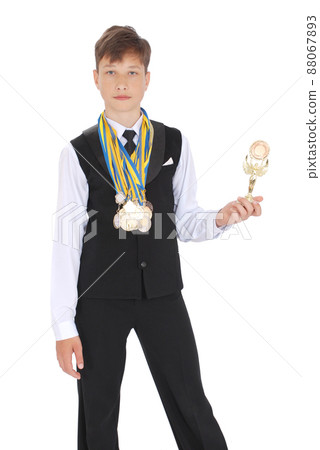 Many gold, silver, and bronze medals winner ballroom dance boy isolated on white background 88067893