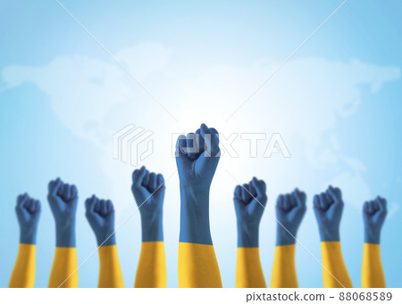 Ukraine flag on Ukrainian people hands for national empowerment and strengthening citizenship fighting for freedom and nation independence from Russian-occupied terrirories 88068589