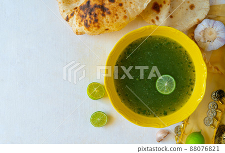 Egyptian Molokhia soup flat lay with copy space 88076821