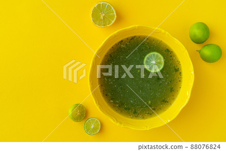 Egyptian Molokhia soup with lime 88076824