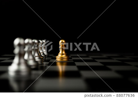Golden Chess pawn standing in front of other chess, Concept of a leader must have courage and challenge in the competition, leadership and business vision for a win in business games Golden Chess pawn standing in front of other chess, Concept of a leader must have courage and challenge in the competition, leadership and business vision for a win in business games 88077636