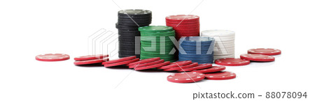 Piles of casino betting chips on a white background Piles of casino betting chips on a white background 88078094