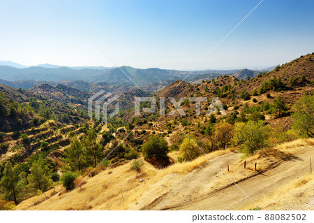 Aerial view of picturesque landscape in the Troodos mountains on a sunny summer day. National park "Troodos Mountains", Cyprus 88082502