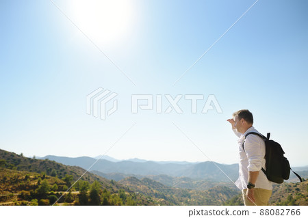 Man in the Troodos mountains on a summer day. National park "Troodos Mountains", Cyprus Man in the Troodos mountains on a summer day. National park "Troodos Mountains", Cyprus 88082766