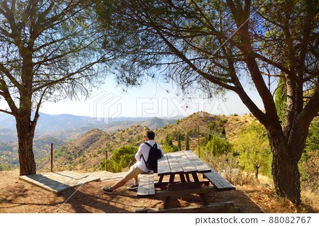 Man in the Troodos mountains on a summer day. National park "Troodos Mountains", Cyprus 88082767