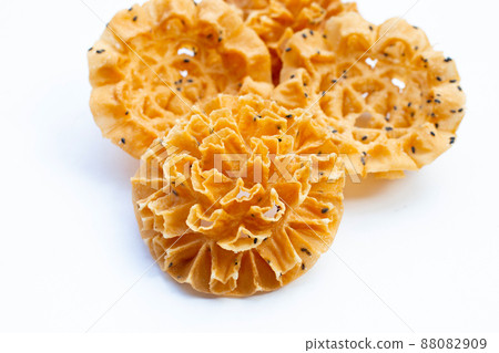 Crispy lotus blossom cookie in white background. Crispy lotus blossom cookie in white background. 88082909