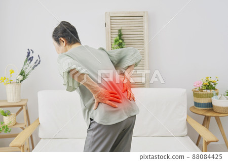 Elderly back pain living room Elderly back pain living room 88084425