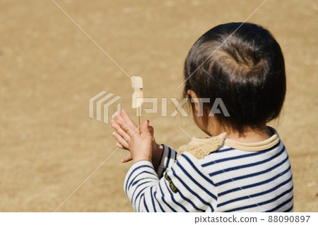 Bamboo dragonfly playing children old image 88090897