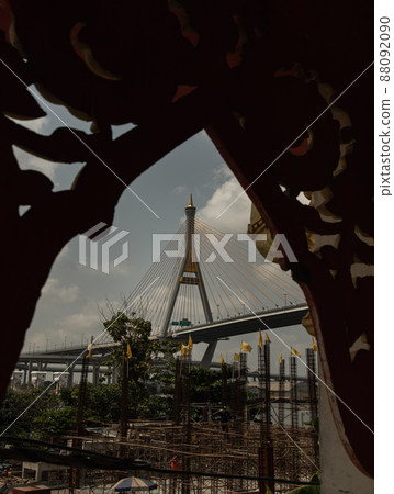 Bhumibol suspension bridge cross over Chao Phraya River at afternoon. 88092090
