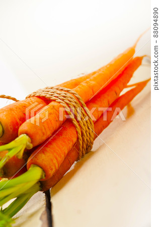 baby carrots bunch tied with rope baby carrots bunch tied with rope 88094890