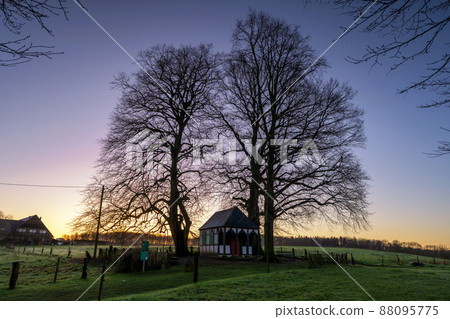 Chapel against sunrise, Bergisch Gladbach, Germany Chapel against sunrise, Bergisch Gladbach, Germany 88095775