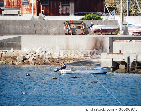 Fishing boat moored at the port of Sada Cape Fishing boat moored at the port of Sada Cape 88096973