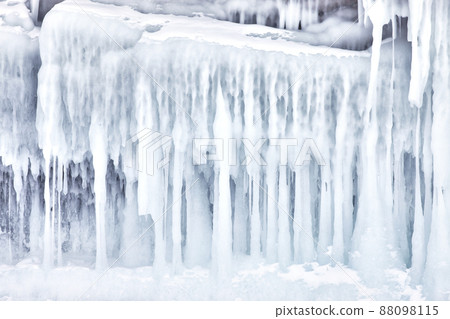 Frozen splash water on Baikal lake. Abstract winter background. Amazing scenery with frozen water Frozen splash water on Baikal lake. Abstract winter background. Amazing scenery with frozen water 88098115