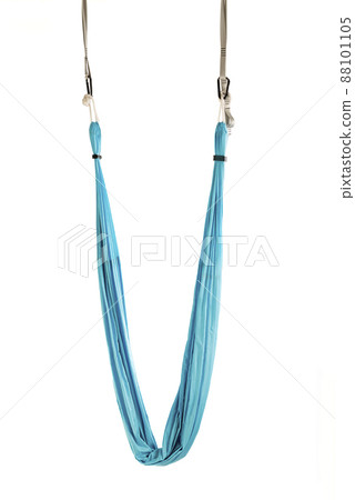 Blue yoga hammock. Sports equipment for exercise antigravity fly yoga or aerial gymnastics on white background. 88101105