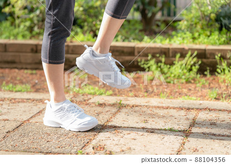 Woman suffering from knee pain, knee joint Woman suffering from knee pain, knee joint 88104356