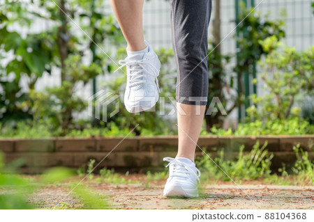 Woman suffering from knee pain, knee joint Woman suffering from knee pain, knee joint 88104368
