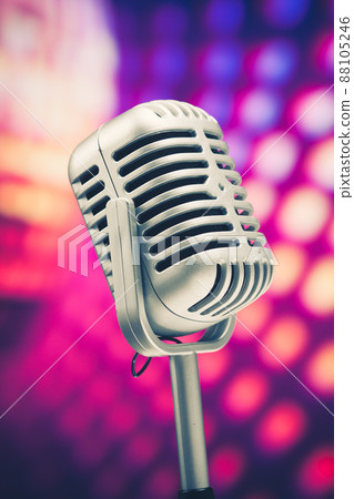 retro microphone on purple disco background 88105246