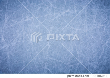 Ice background with marks from skating and hockey, blue texture of rink surface with many scratches Ice background with marks from skating and hockey, blue texture of rink surface with many scratches 88106062