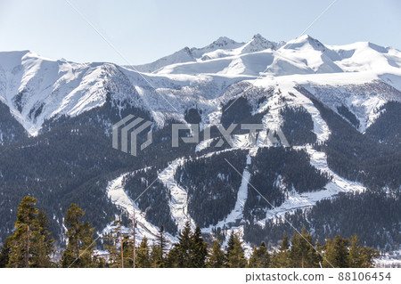 Skiing high up in the mountains in Russia Skiing high up in the mountains in Russia 88106454