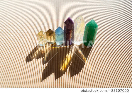 Healing crystals on brown background Healing crystals on brown background 88107090