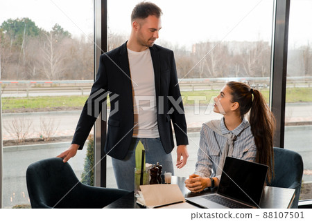 Teamwork. Business meeting of partners in cafe. Working with laptop 88107501