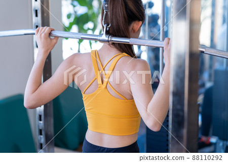 Young woman training in a sports gym 88110292