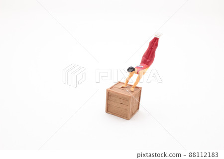 a fun of mini man gymnasts with box a fun of mini man gymnasts with box 88112183