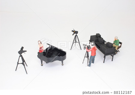 the Presenters and video camera operator working in studio. News broadcasting the Presenters and video camera operator working in studio. News broadcasting 88112187