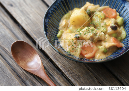 Tomato cream stew with plenty of vegetables and chicken Tomato cream stew with plenty of vegetables and chicken 88112604