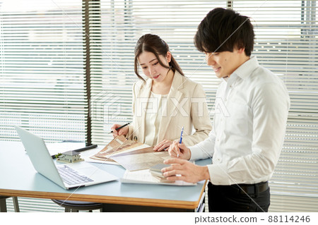 Asian architect designing a house 88114246