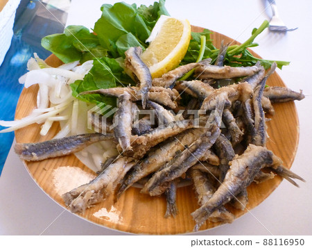 A plate of freshly fried anchovies in a Turkish diner 88116950