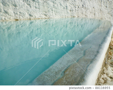 Close-up of white limestone rice terrace ridges in Pamukkale, Turkey Close-up of white limestone rice terrace ridges in Pamukkale, Turkey 88116955