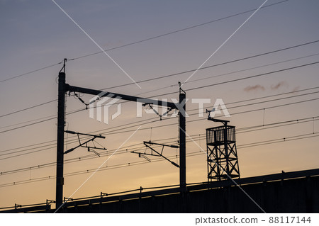 Sunrise and Shinkansen overhead wire pillars 88117144