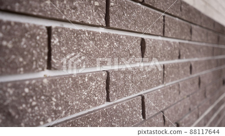 Background of a new brick wall. Brown brick wall. Background of a new brick wall. Brown brick wall. 88117644