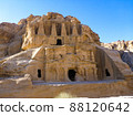 Obelisk tomb and clear blue sky at Petra archaeological site in Jordan 88120642