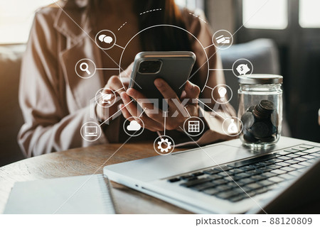 Business women think of the concept of saving money. Business women think of the concept of saving money. 88120809