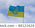 Blurred Ukrainian flag fluttering in strong wind. 88121628