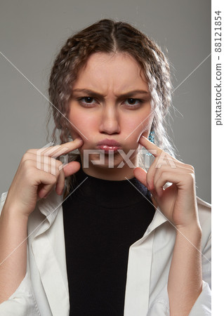 fun woman grimacing fun woman grimacing 88121854