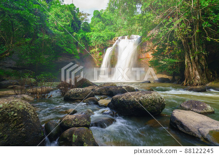 Beautiful waterfall with sunlight in jungle, Haew Suwat Waterfall at khao yai Nakhonratchasima province Beautiful waterfall with sunlight in jungle, Haew Suwat Waterfall at khao yai Nakhonratchasima province 88122245