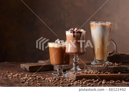 Coffee and chocolate drinks with whipped cream. Coffee and chocolate drinks with whipped cream. 88122492
