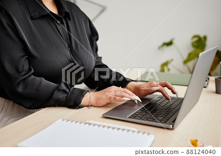 Woman with Manicure Typing at Keyboard Woman with Manicure Typing at Keyboard 88124040