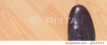 Elegant stylish leather navy blue shoe for men on board, place for text Elegant stylish leather navy blue shoe for men on board, place for text 88124511