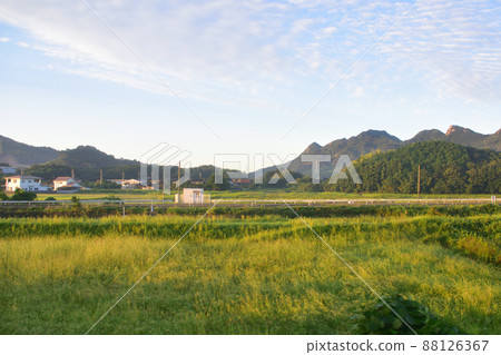 2021. Morning view of the train window from Shin-Yamaguchi Station on the Sanyo Main Line to Tokuyama Station 88126367