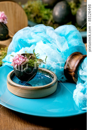Easter table setting with empty turquoise ceramic tableware Easter table setting with empty turquoise ceramic tableware 88126498