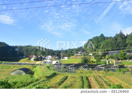 2021. Morning view of the train window from Tokuyama Station on the Sanyo Main Line to Iwakuni Station 88126968