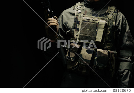 Soldier holding a gun 88128670
